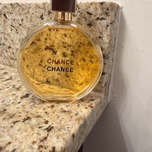 CHANEL Chance Fragrance with Amber Hue